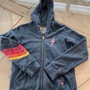 Aviator Nation sleeve striped arm and lighting bolt zip up